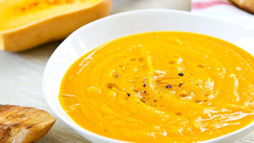 Spiced Carrot-Butternut Squash Soup with Pine Nut Cream