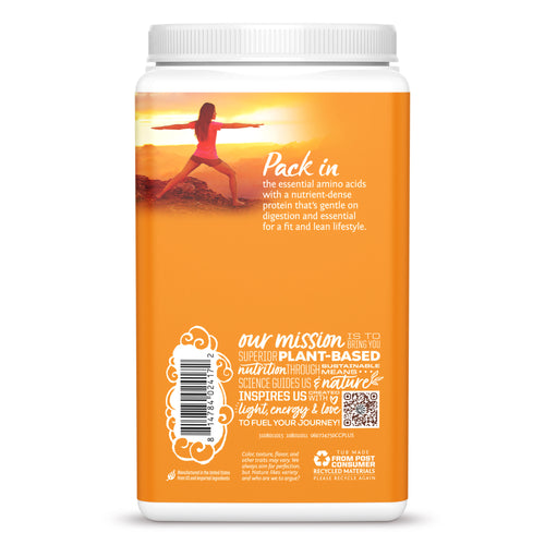 Back view of orange plant-based protein powder container with wellness text and sunset yoga image